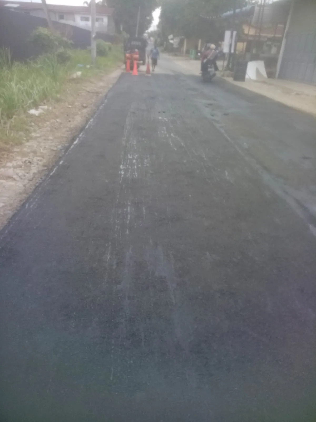Dokumentasi pekerjaan pengaspalan proyek 33